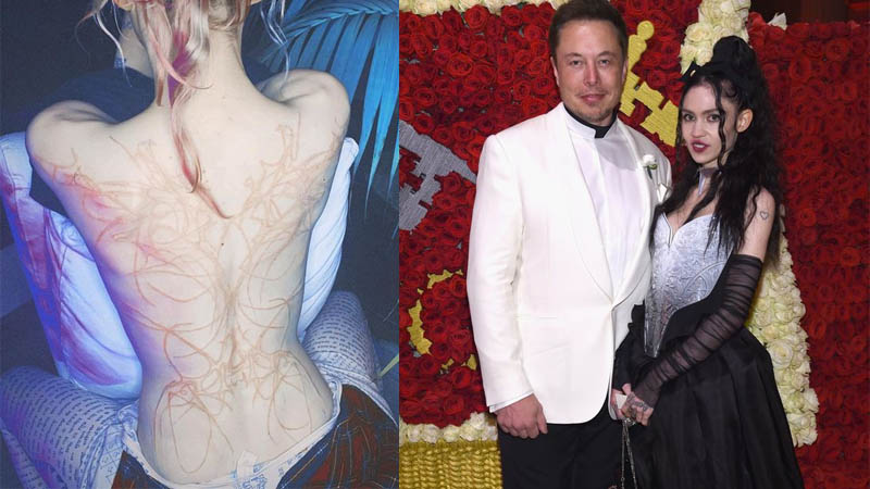 Elon Musk S Girlfriend Grimes Goes Topless To Show Off Giant Alien Back Tattoo