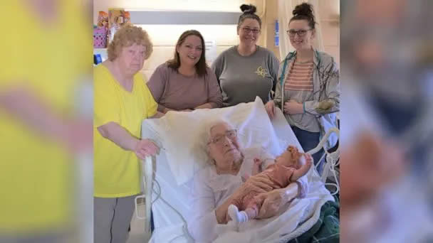 Hawkins holds great-great-great granddaughter