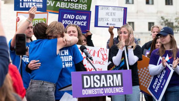 Gun safety and domestic violence prevention organizations gather outside of the Supreme Court before oral arguments are heard in United States v. Rahimi.