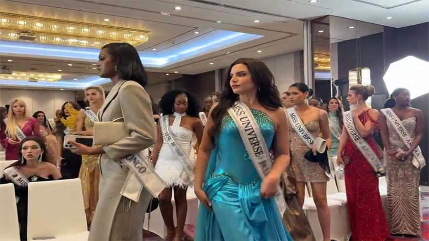 Miss Universe contestants walk out
