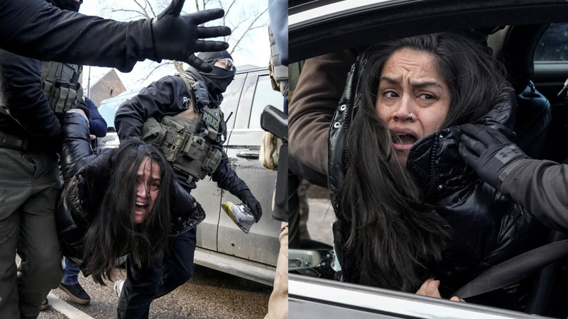 Federal agents grab a woman to drag her away from her car