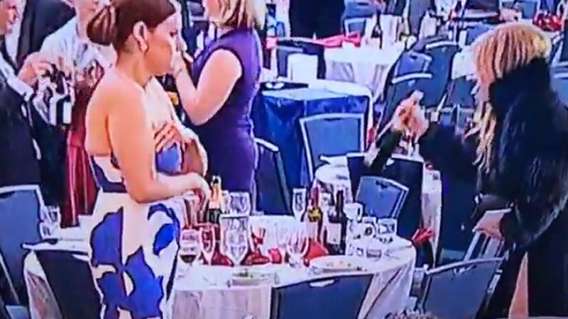 woman caught grabbing bottles during White House Correspondents' Dinner shooting chaos
